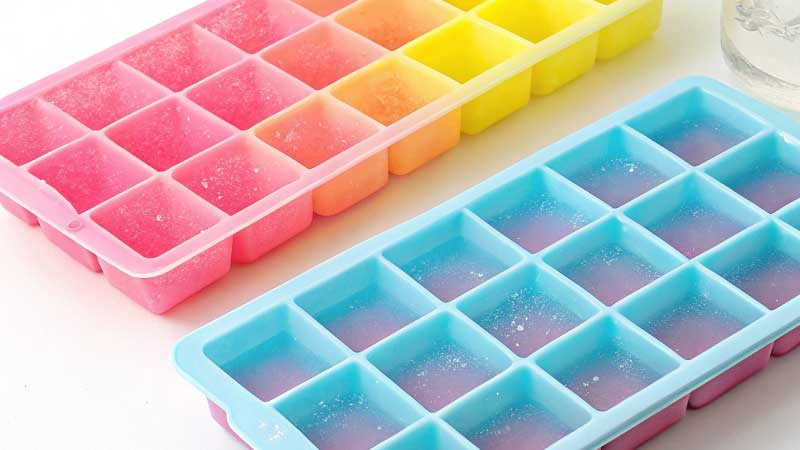 A flimsy, brightly colored silicone ice cube tray from a discount store